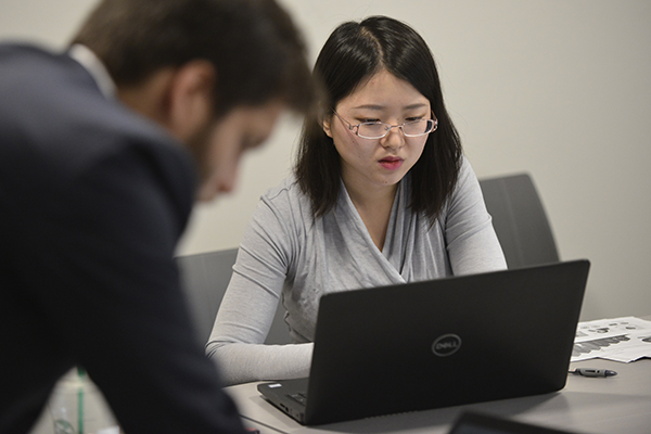 Simon Business School master’s students prepare for a challenging case competition. 