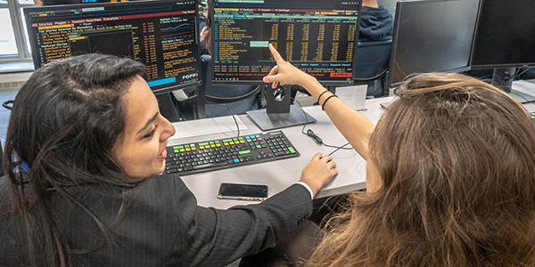 Simon Students in Front of a Bloomberg Terminal
