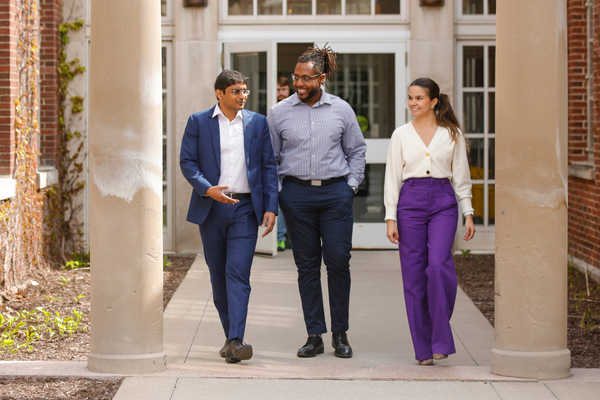 MBA students walk and talk in the Florescue Plaza