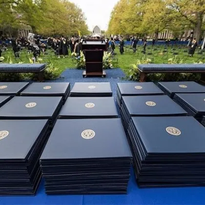 Diplomas are presented to Simon Business School graduates at commencement 2022